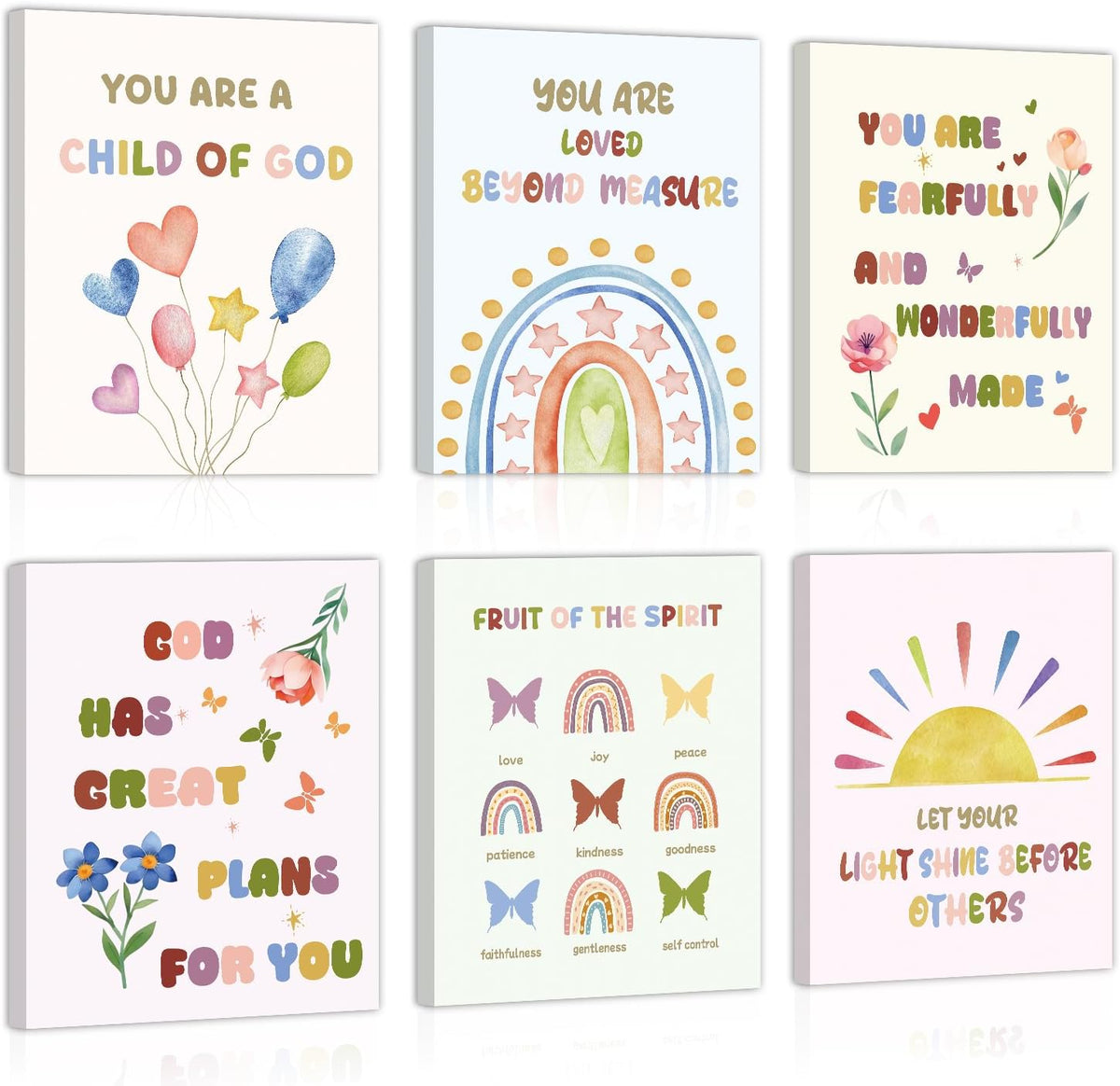 Nine pastel nursery-style prints with rainbows, flowers, butterflies and uplifting phrases arranged in a grid.