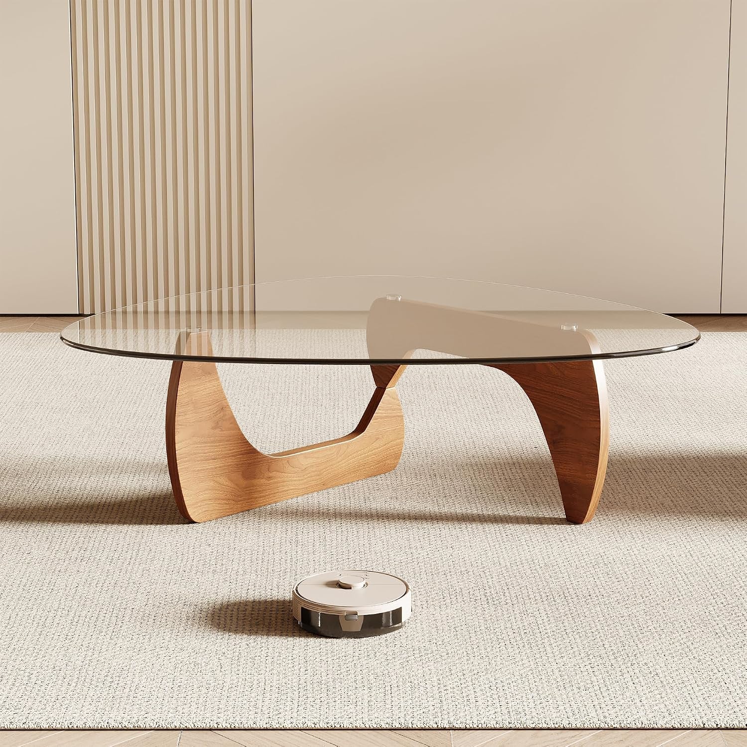 Side profile of triangle glass coffee table with curved wood legs on a neutral rug