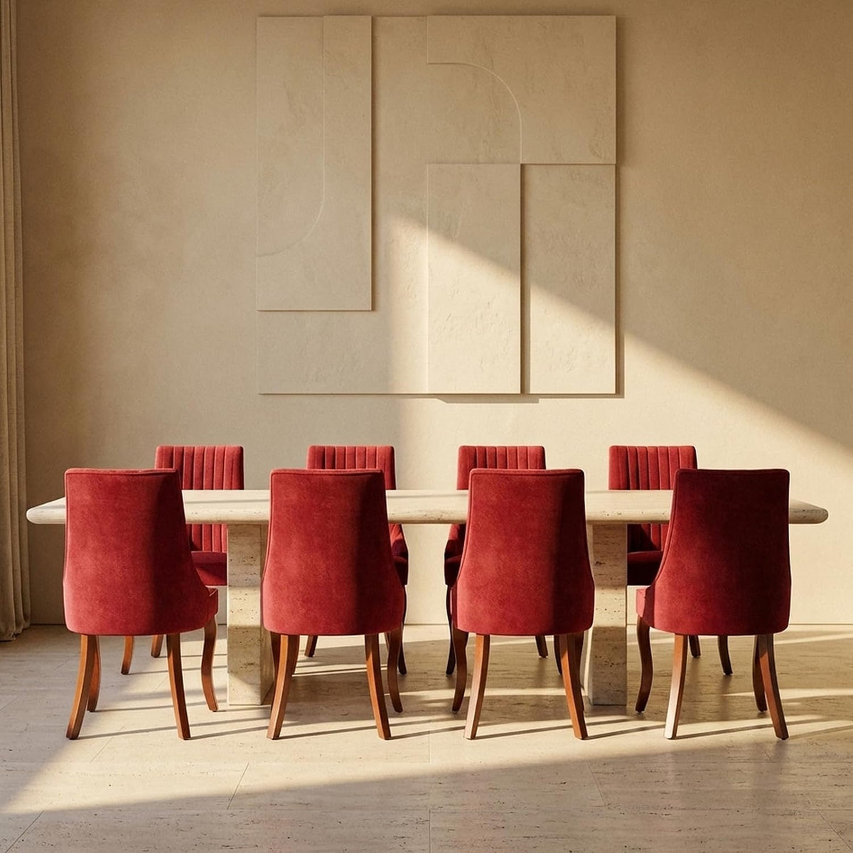 Eight deep red upholstered dining chairs arranged around a long stone table from the rear.