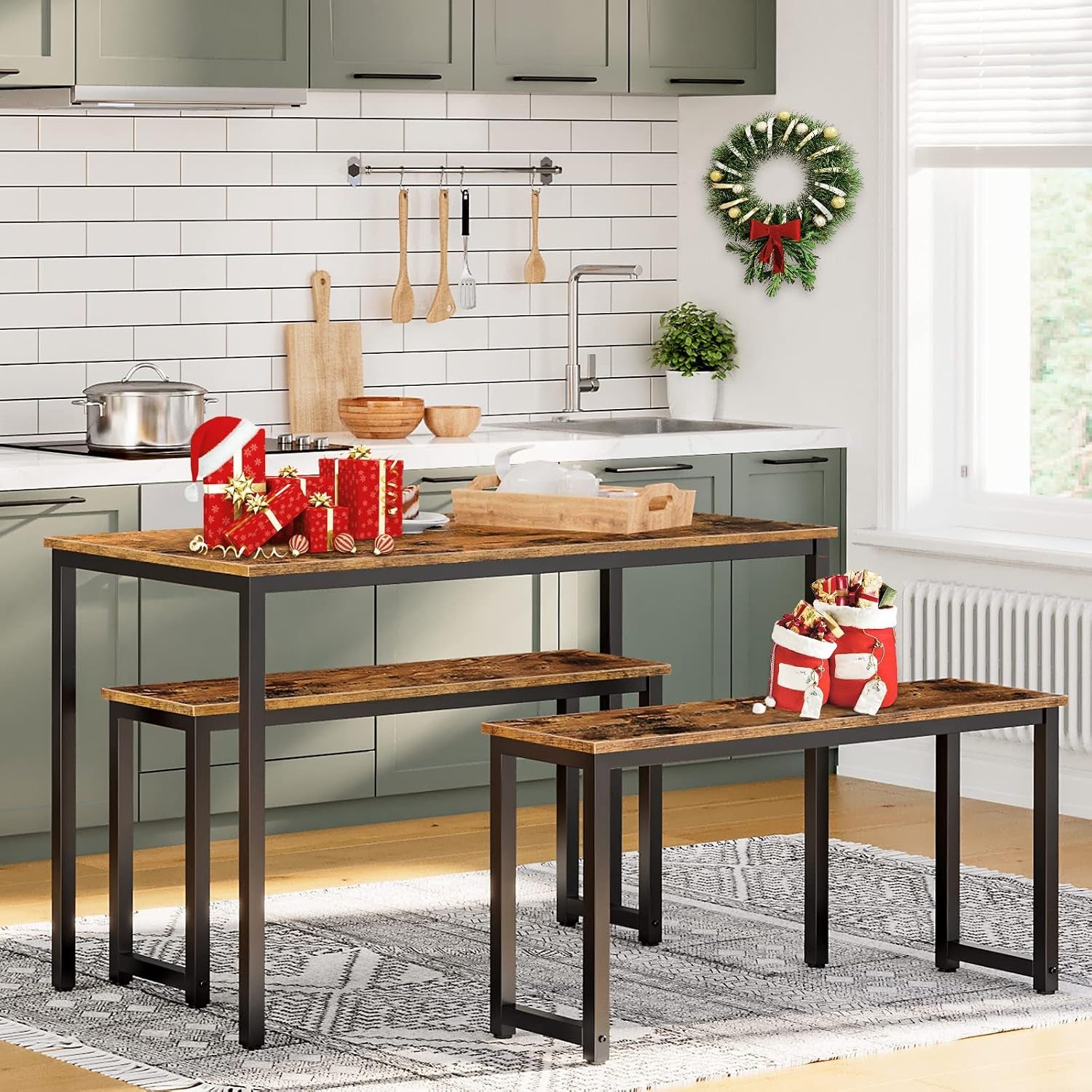 Bench pair and matching table in a kitchen setting with holiday gift boxes on the table and a wreath on the wall.