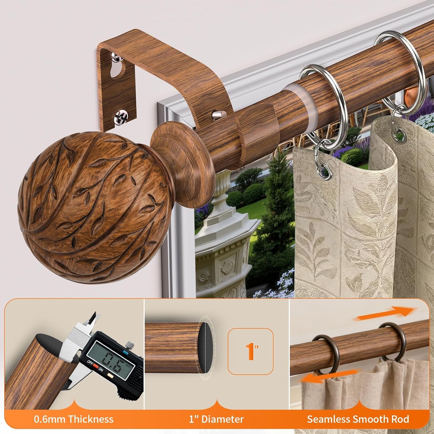 Angled view of wood-grain rod with curtain rings and carved finial installed over a window with an exterior garden view.