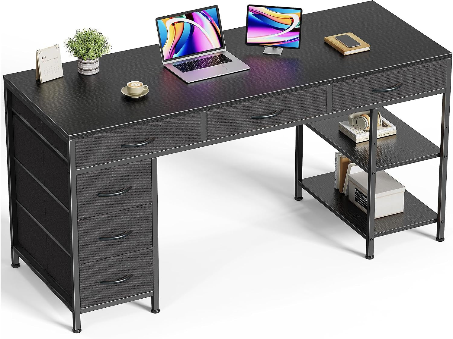 Studio shot of the desk on a white background, staged with laptop, monitor, plant and two open shelves at right