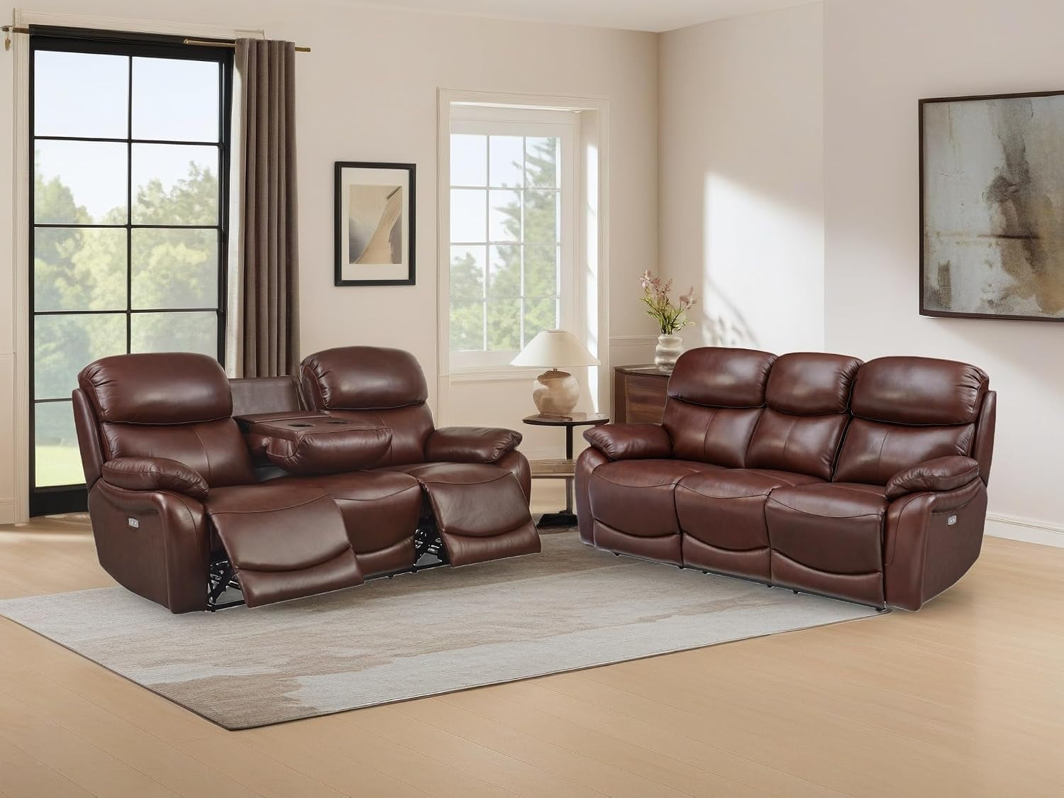 Brown leather reclining sofa and loveseat set in a living room with both footrests extended on the loveseat.