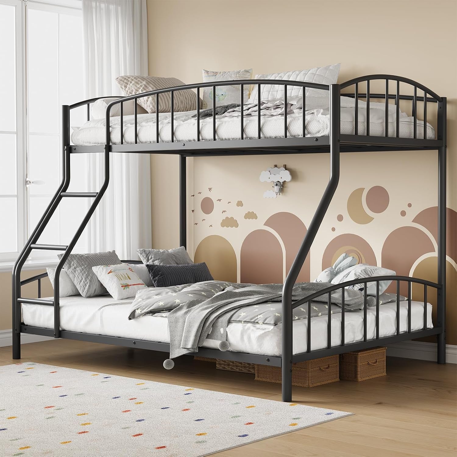 Dark metal twin-over-full style bunk bed in a bright kids' room with ladder and patterned wall decal.
