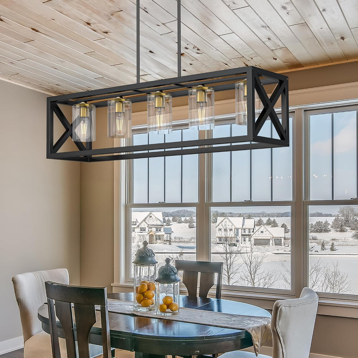 Rectangular pendant with five clear glass shades shown in a dining room with tall windows and wood ceiling