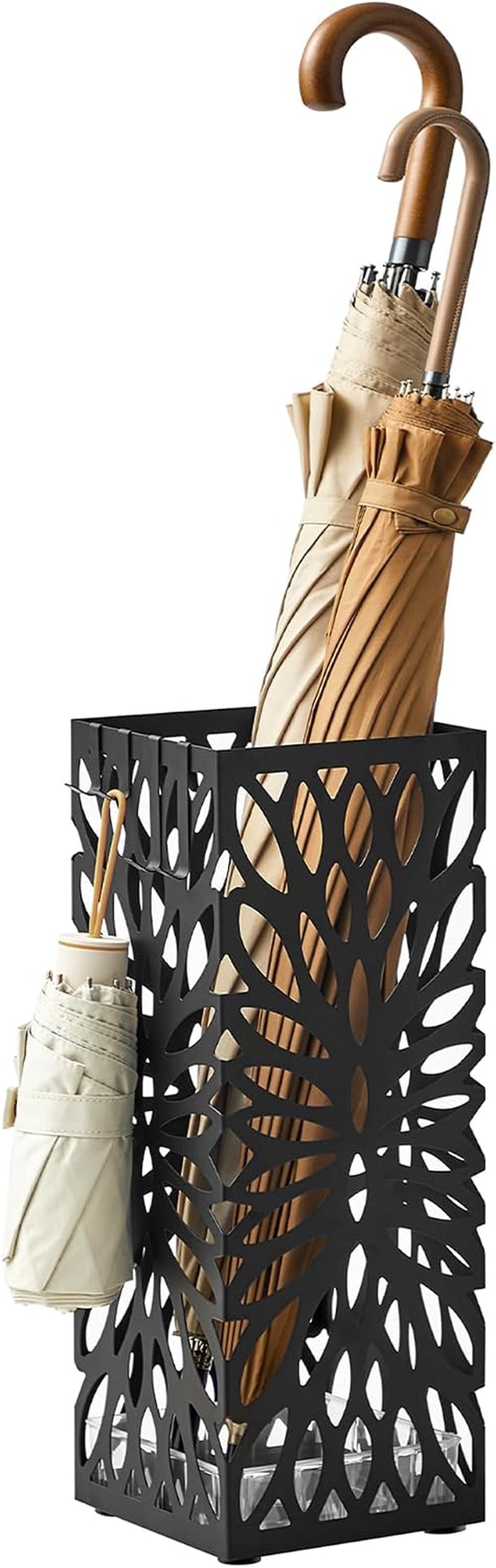 Black metal umbrella stand with leaf-pattern cutouts, angled front view showing clear drip tray and long umbrellas