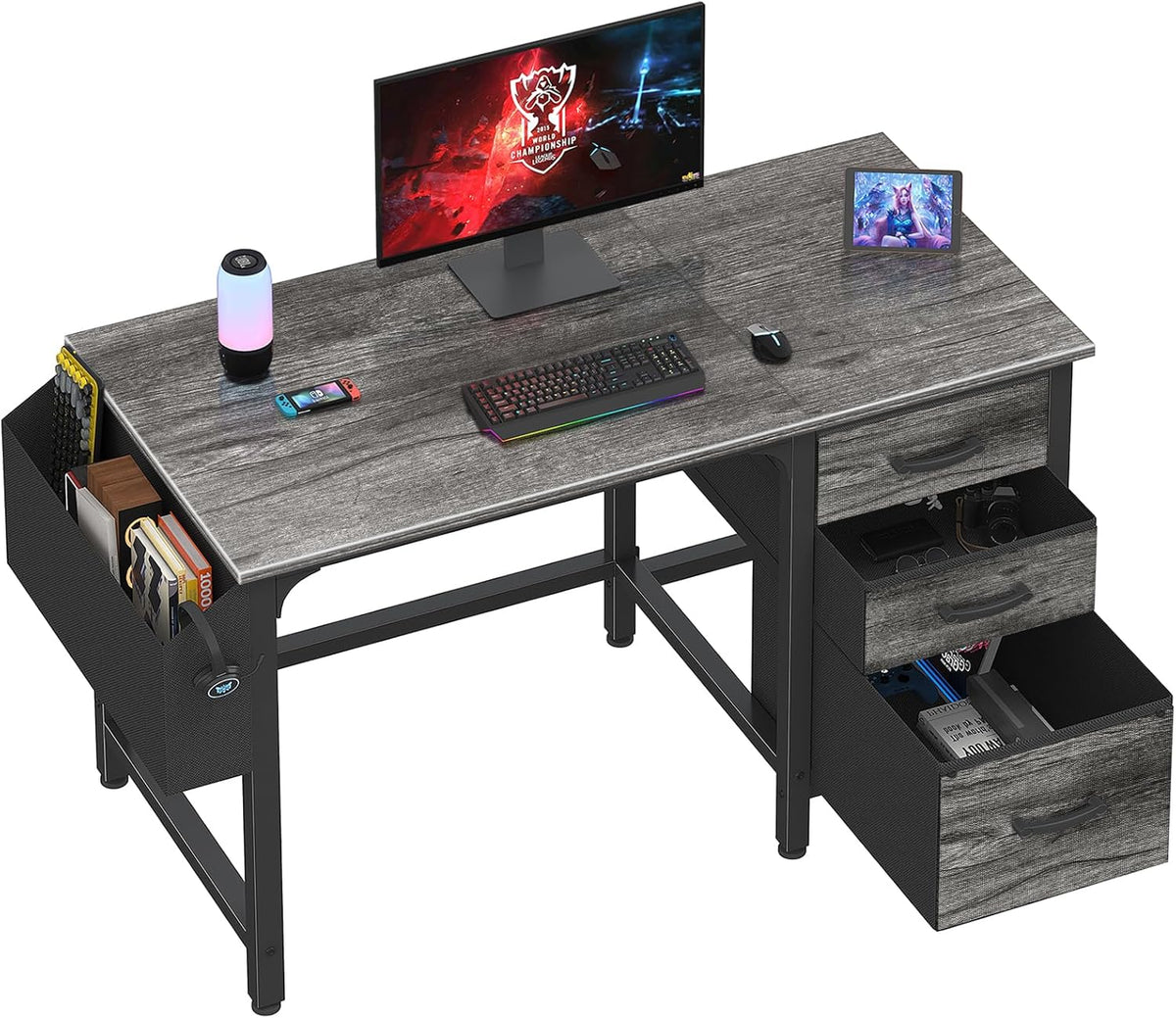 Gray weathered-wood desk top with black frame, fabric file pocket at left and three fabric drawers at right.