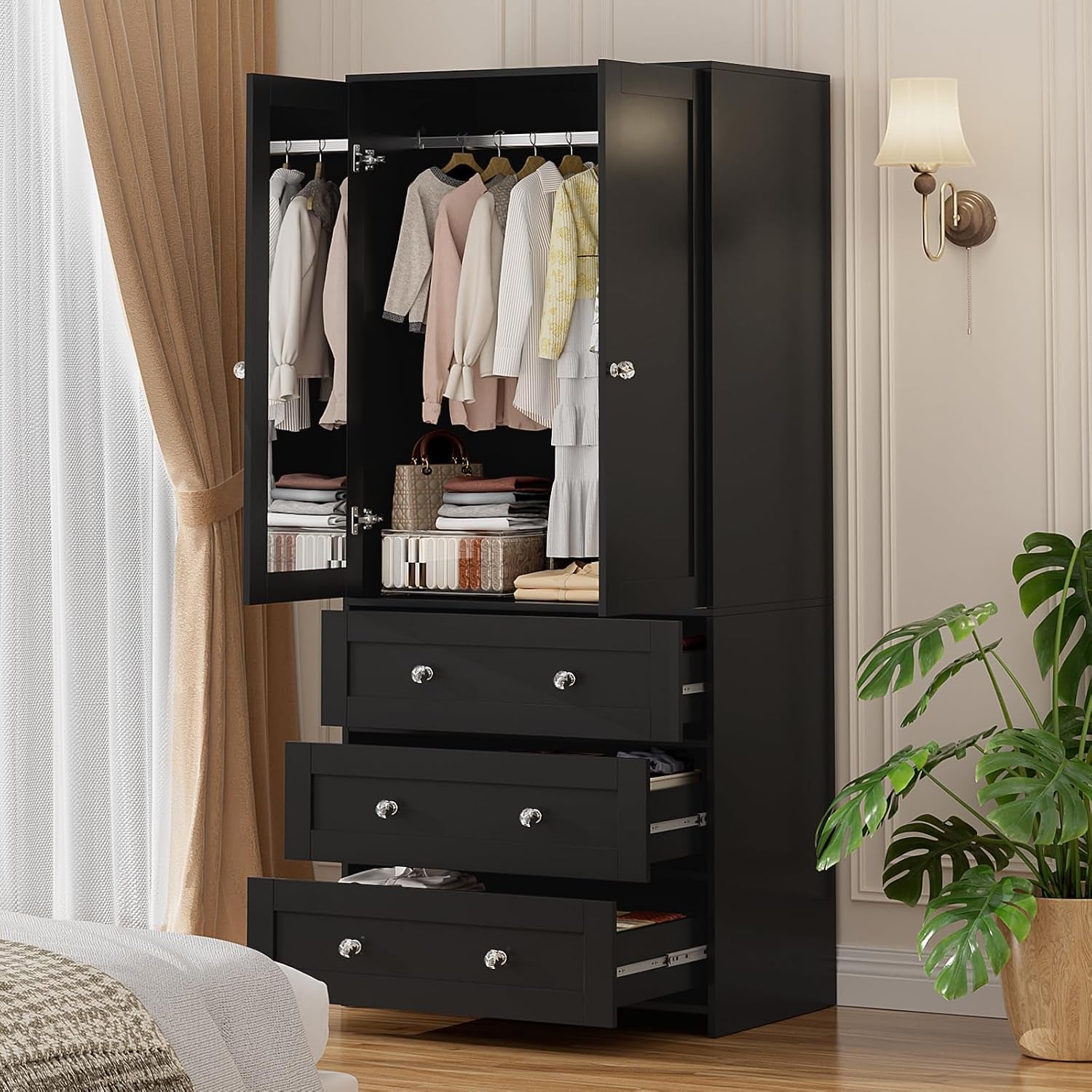 Three-quarter view of the wardrobe with both doors open showing hanging clothes and drawers partially extended
