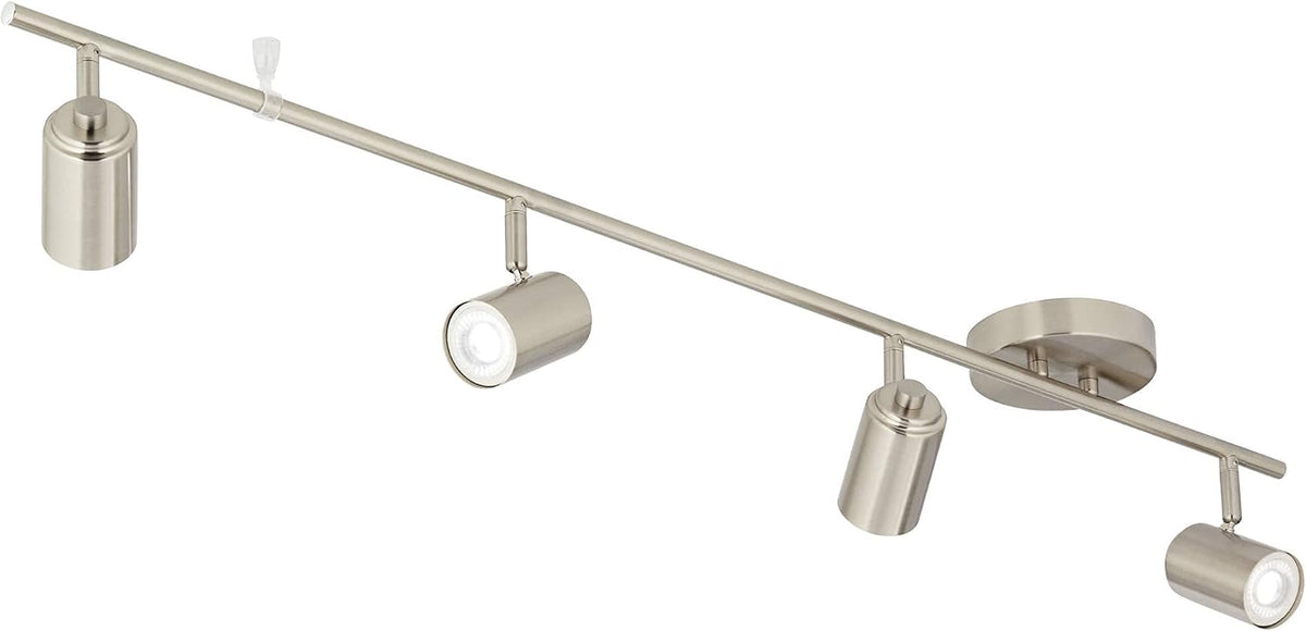 Diagonal view from below showing two LED lenses glowing and two other heads along the slim brushed-nickel bar.