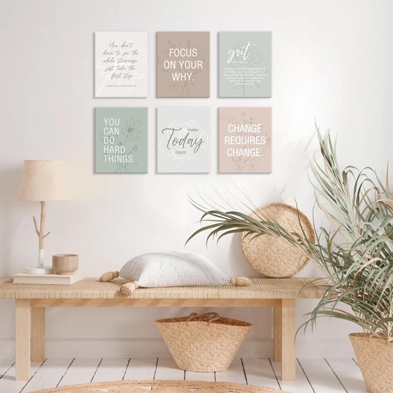 Six motivational canvas prints mounted above a wooden bench with woven cushions and decorative basket