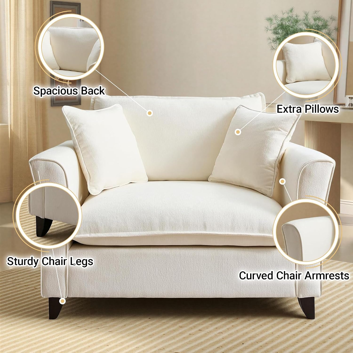 Front-facing cream chair closeup highlighting curved armrests, two pillows and tapered dark legs with callouts