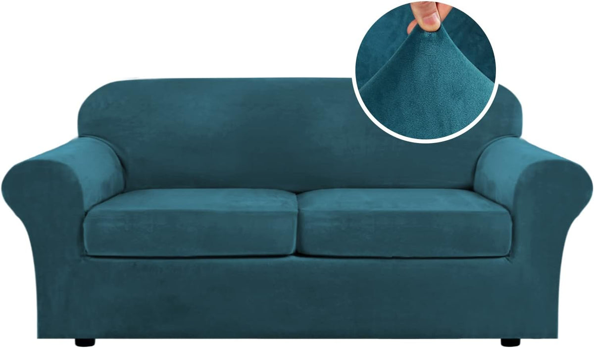 Deep teal three-seat sofa front view showing rounded arms, two seat cushions and a circular inset of fabric pulled taut