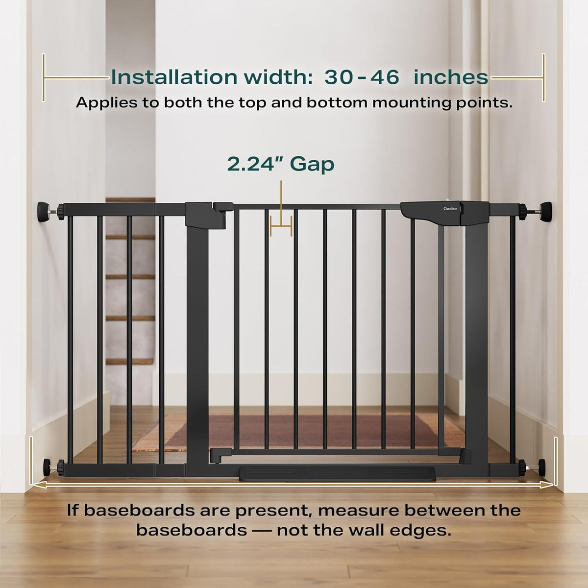 Front-facing view of the black gate across a doorway showing vertical bars and wall-mounted pressure pads.
