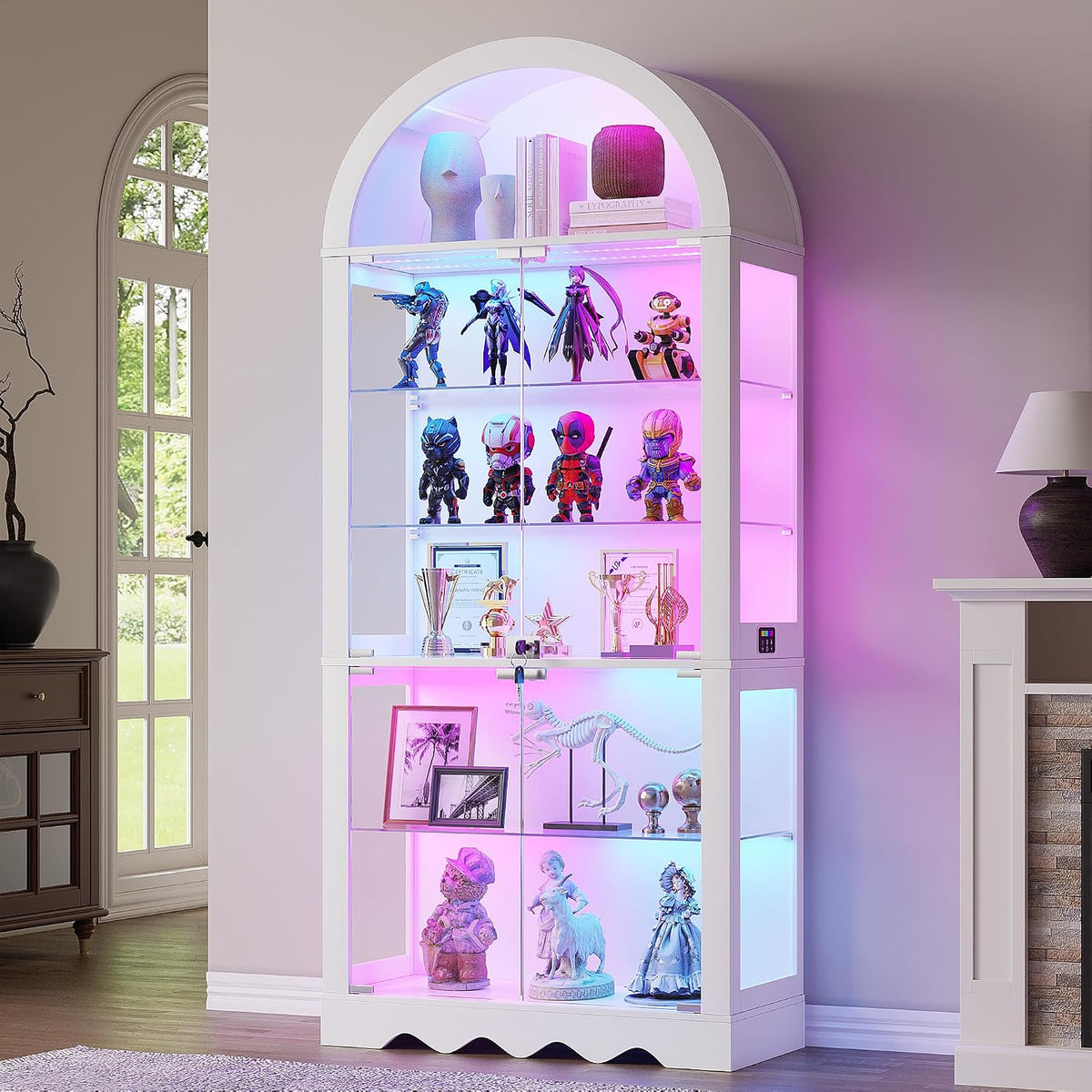White arched curio cabinet lit with multicolor RGB LEDs displaying collectible figures and trophies.