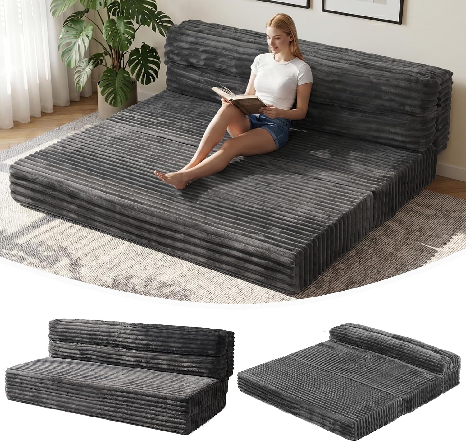 Dark grey corduroy tri-fold futon opened as a wide floor sofa bed with a person reading