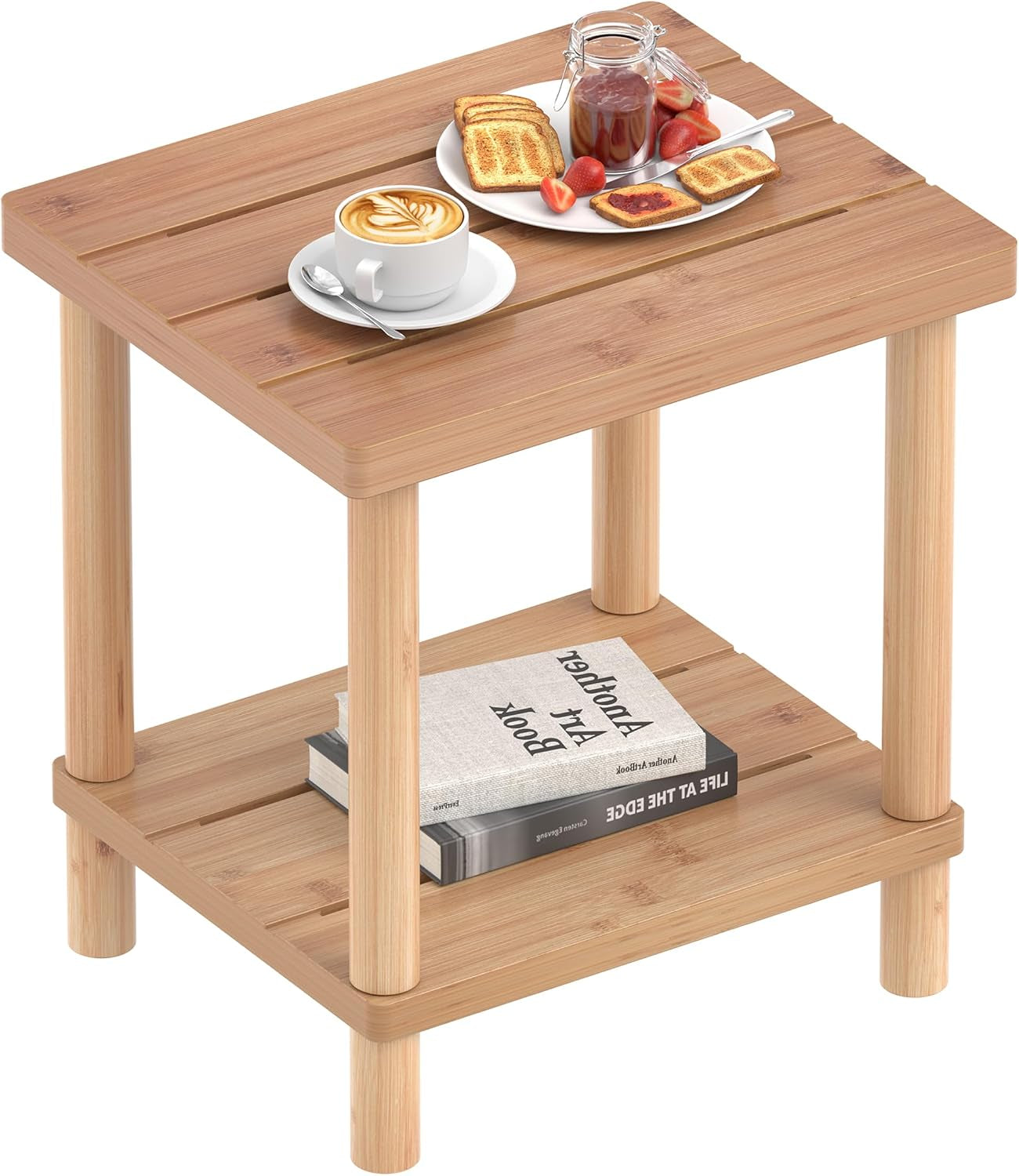 Angled view of a natural bamboo two-tier side table with breakfast items on top and books on the lower shelf.
