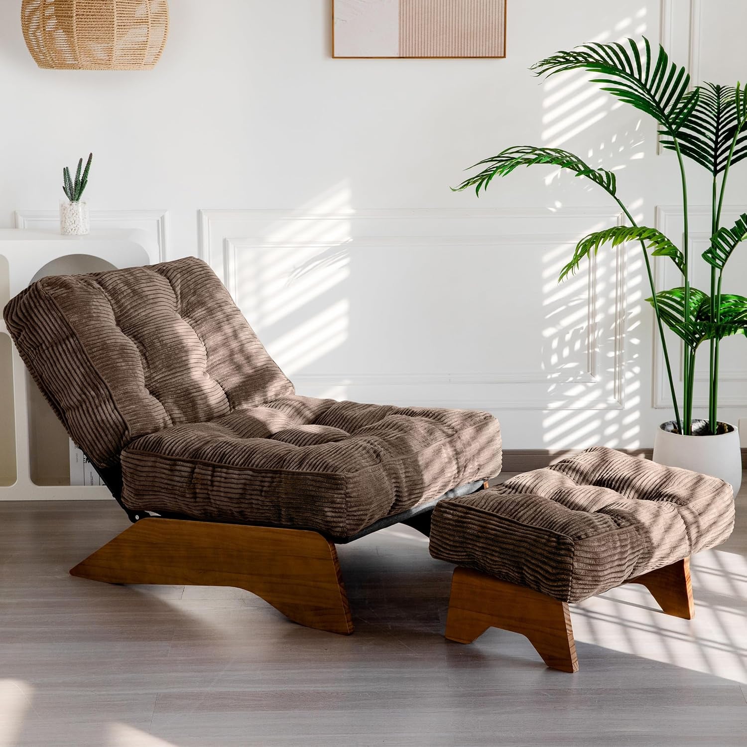 Brown corded fabric tufted chair and matching ottoman beside a potted plant in bright room