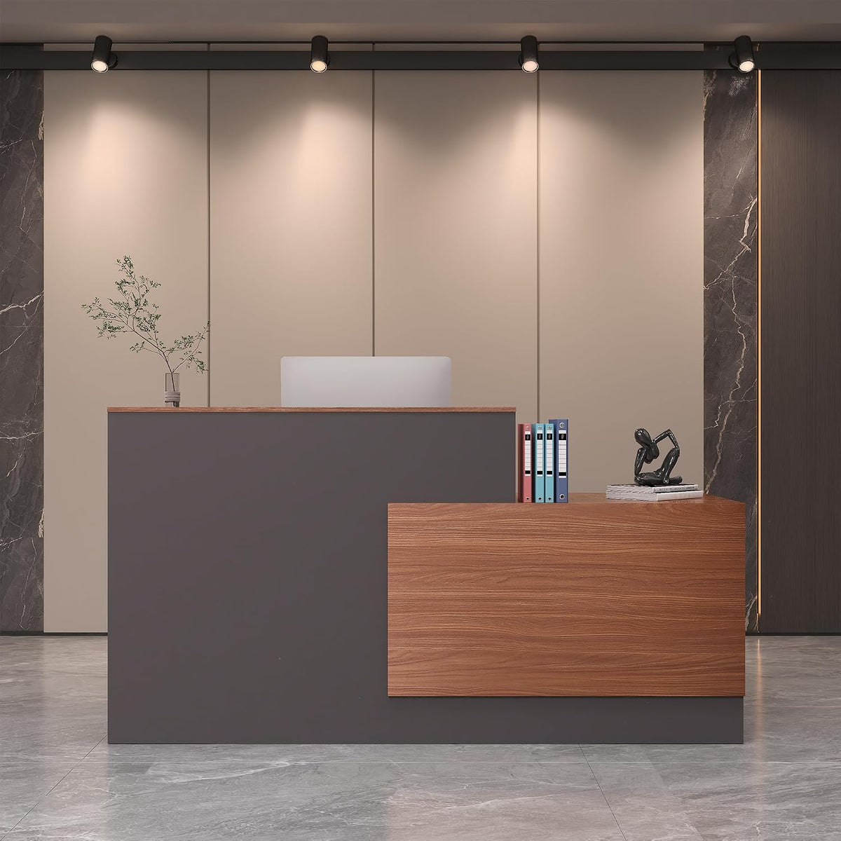 Front view of L-shaped reception desk in slate gray with walnut-tone front panel in a showroom setting