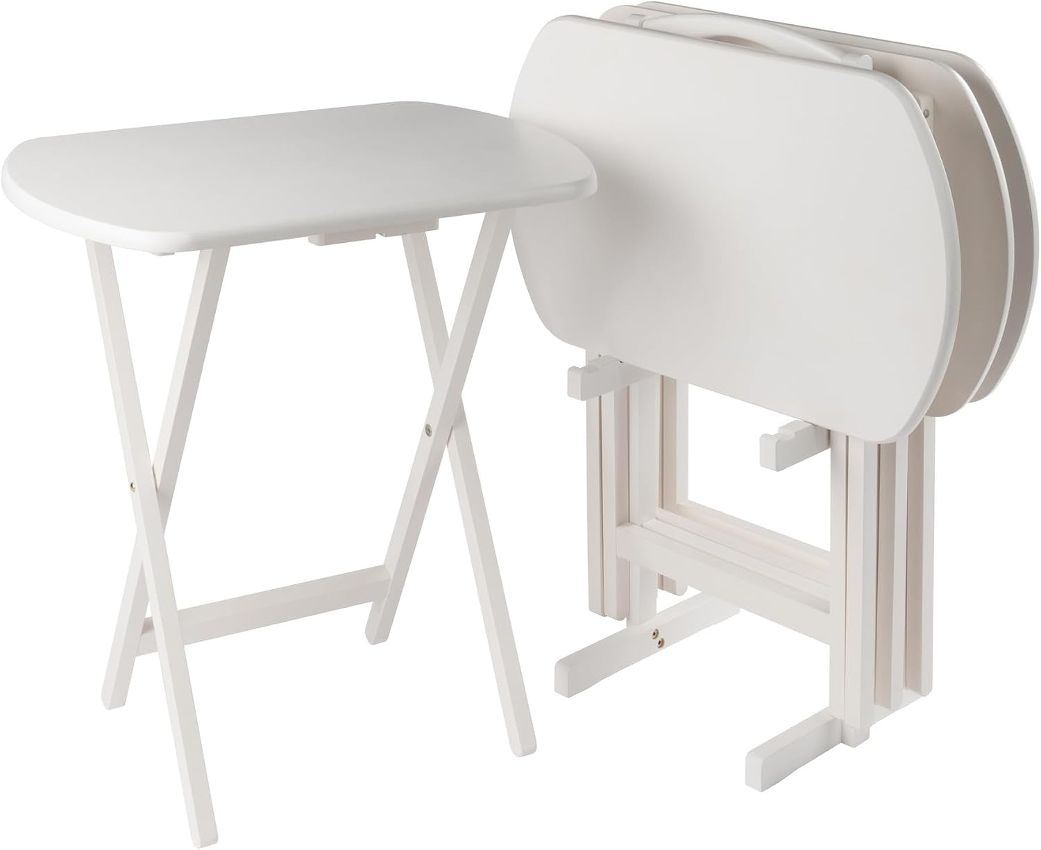 One white foldable snack table open next to two white folded tables stored upright on a stand.