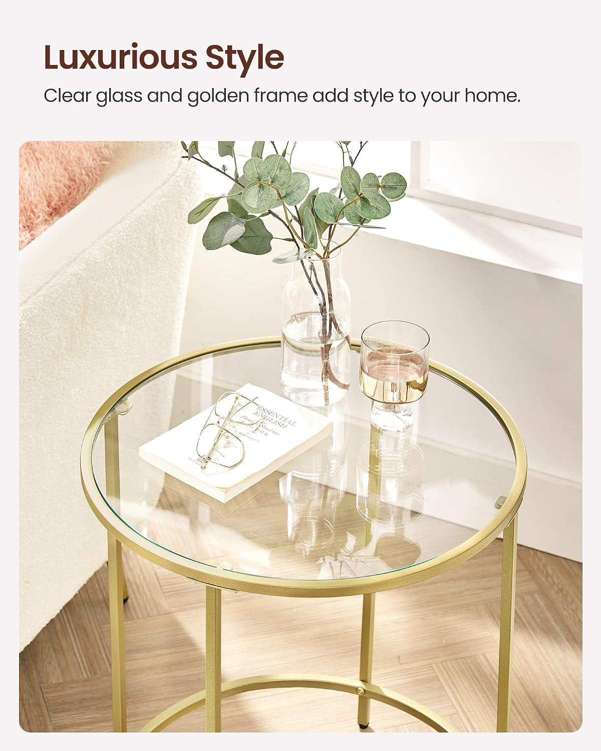 Top-down view of the round tempered glass tabletop with reflections and small decor items