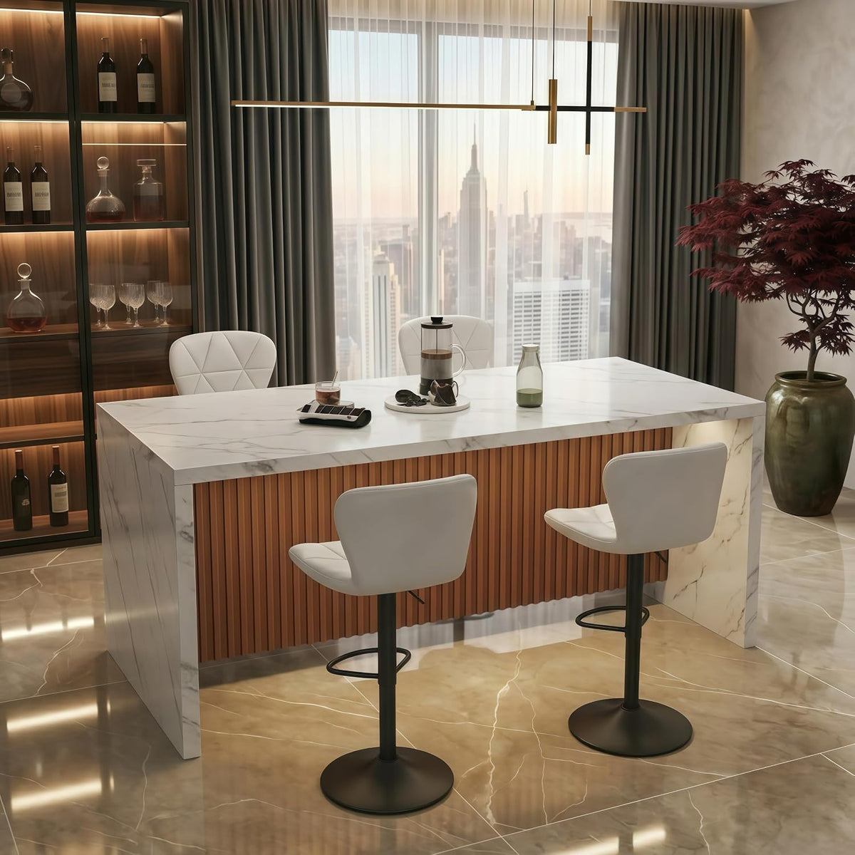 White faux-marble island table with brown fluted front and two bar stools in a city-view dining room.