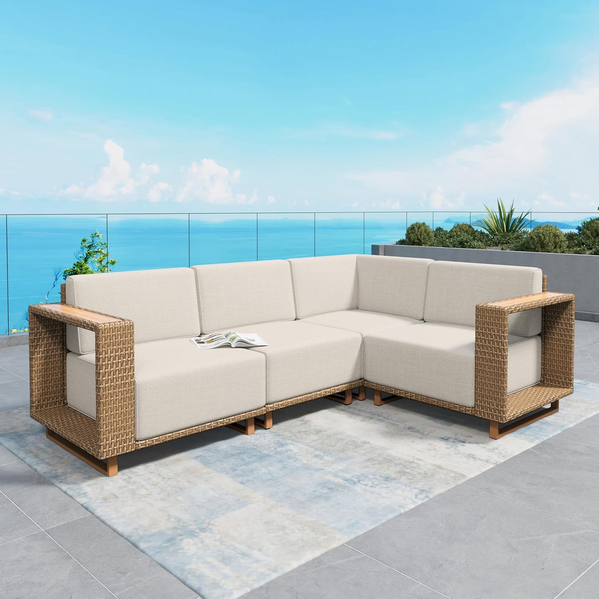 L-shaped corner configuration of the modular sectional with beige cushions and woven arm frames on a patio rug.