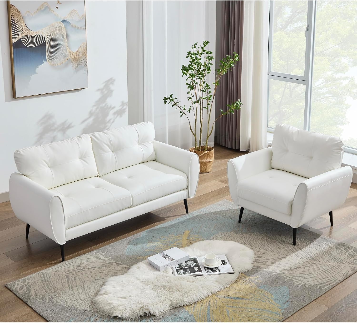 Sunlit living room with a white tufted loveseat and matching armchair on a patterned rug.