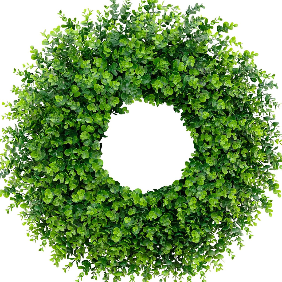 Top-down view of a full round artificial boxwood wreath with dense small green leaves and a central opening.