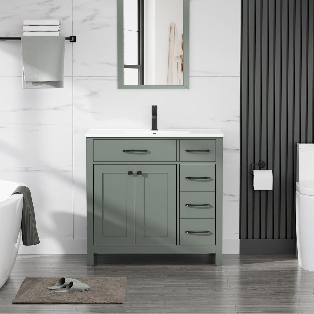 Front view of a single sage green vanity with white sink top and dark hardware.