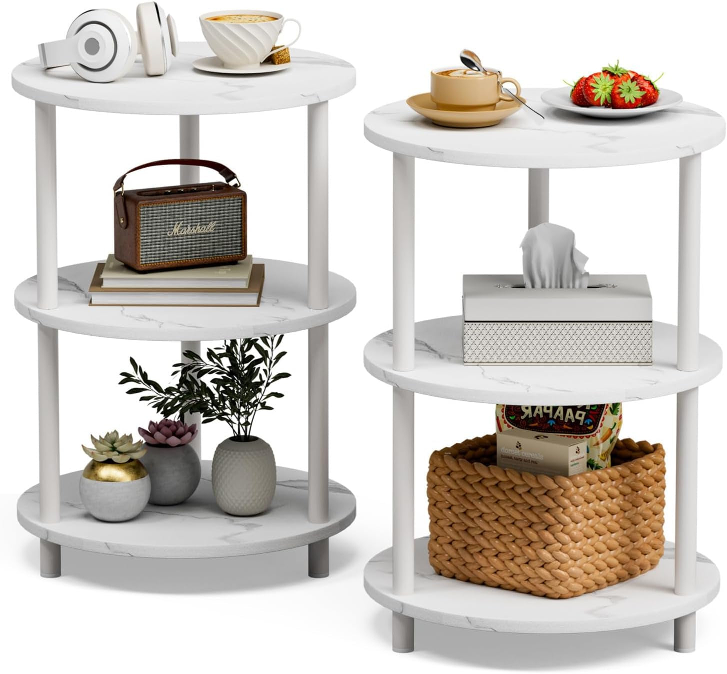 Two white three-tier round side tables on a white background, styled with cups, baskets, books and small potted plants.