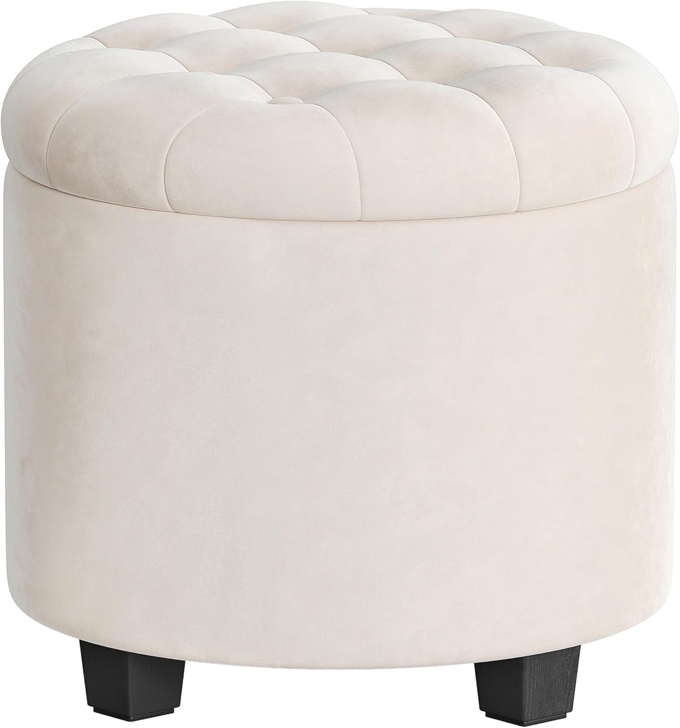 Pale cream round ottoman with button-tufted lid and short black tapered legs, close front angle