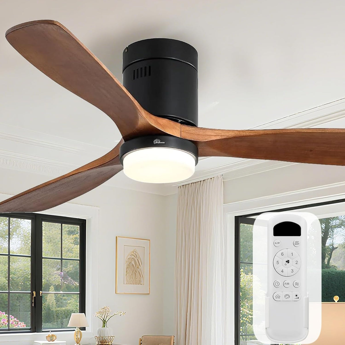 Close underside shot of dark wood blades with matte black motor and illuminated light bowl.