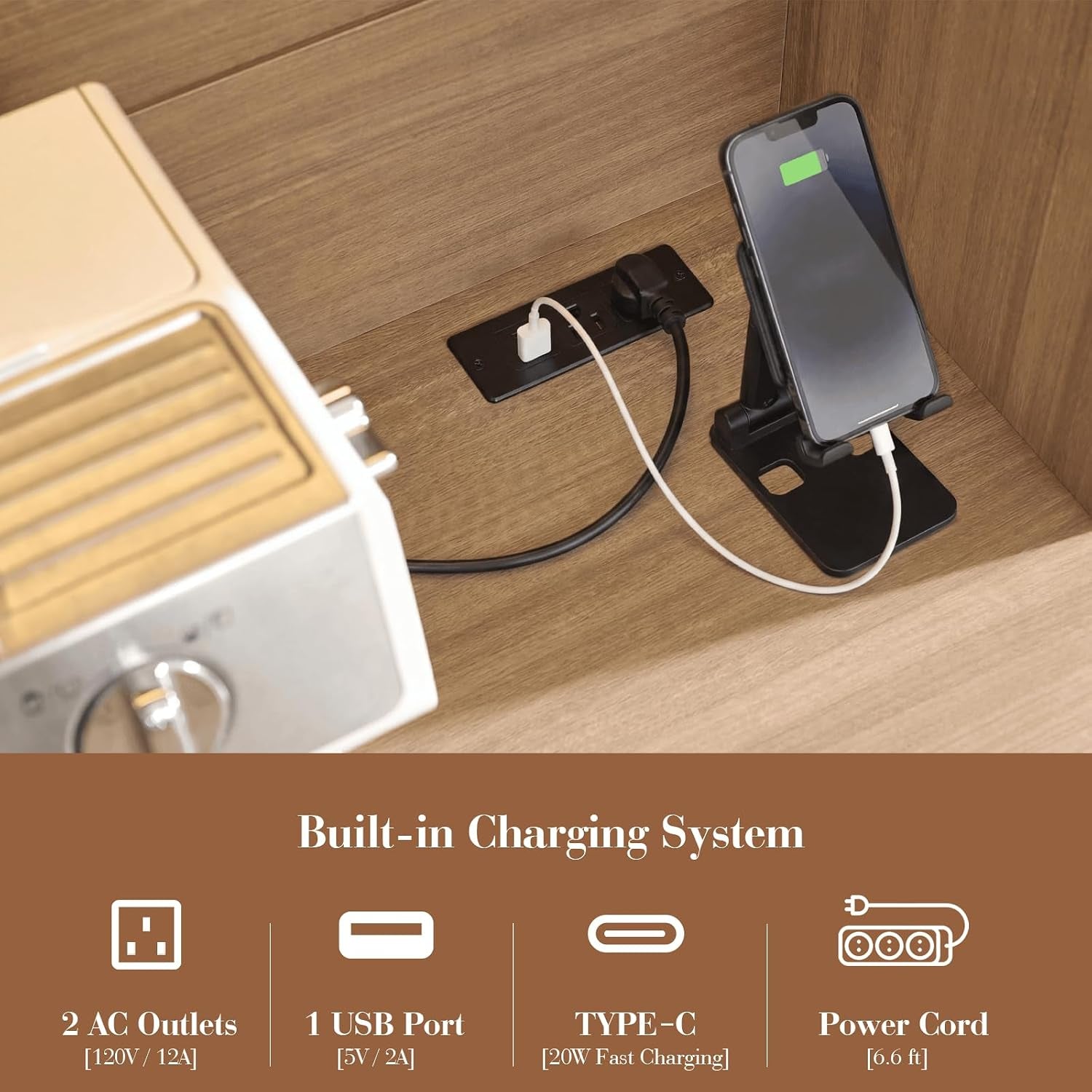 Close-up of the cabinet interior showing the built-in charging station with phone and appliance plugged in on the countertop