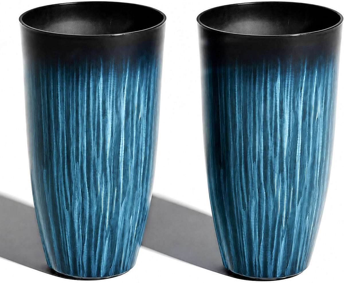 Pair of tall tapered planters with a glossy blue textured vertical stripe pattern casting a shadow.