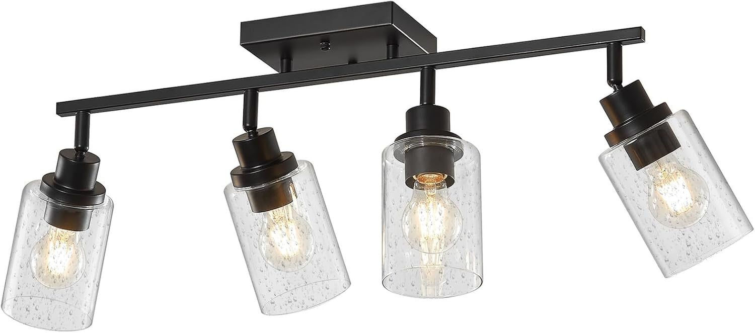 Five-light matte black track fixture on white background, three shades facing forward and two slightly angled outward