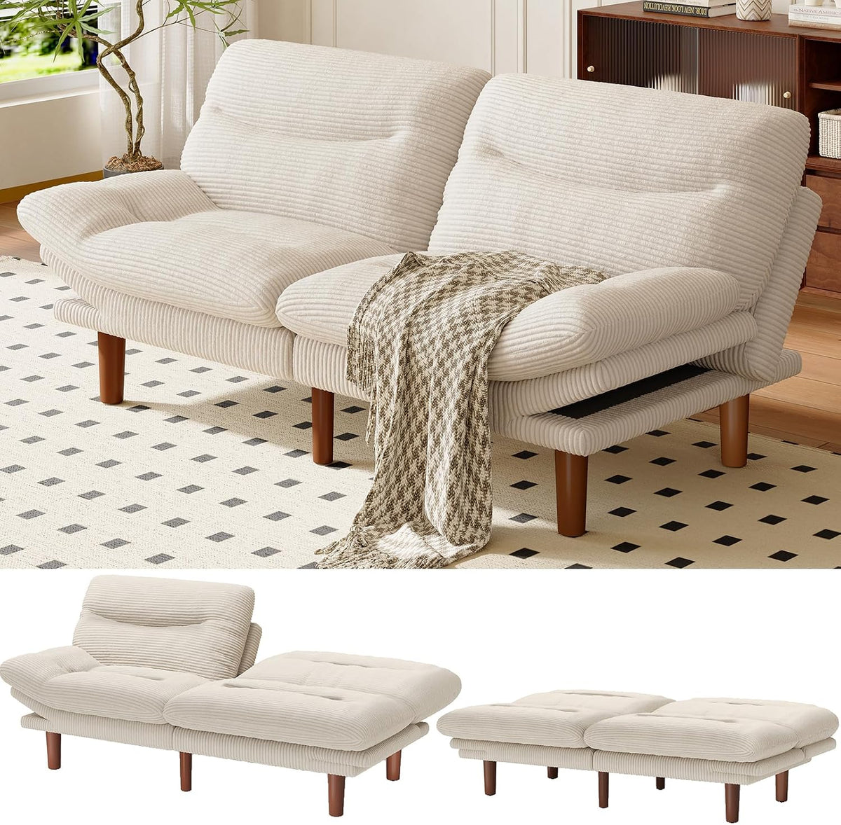 Cream corduroy futon sofa in a living room with patterned throw draped over the seat