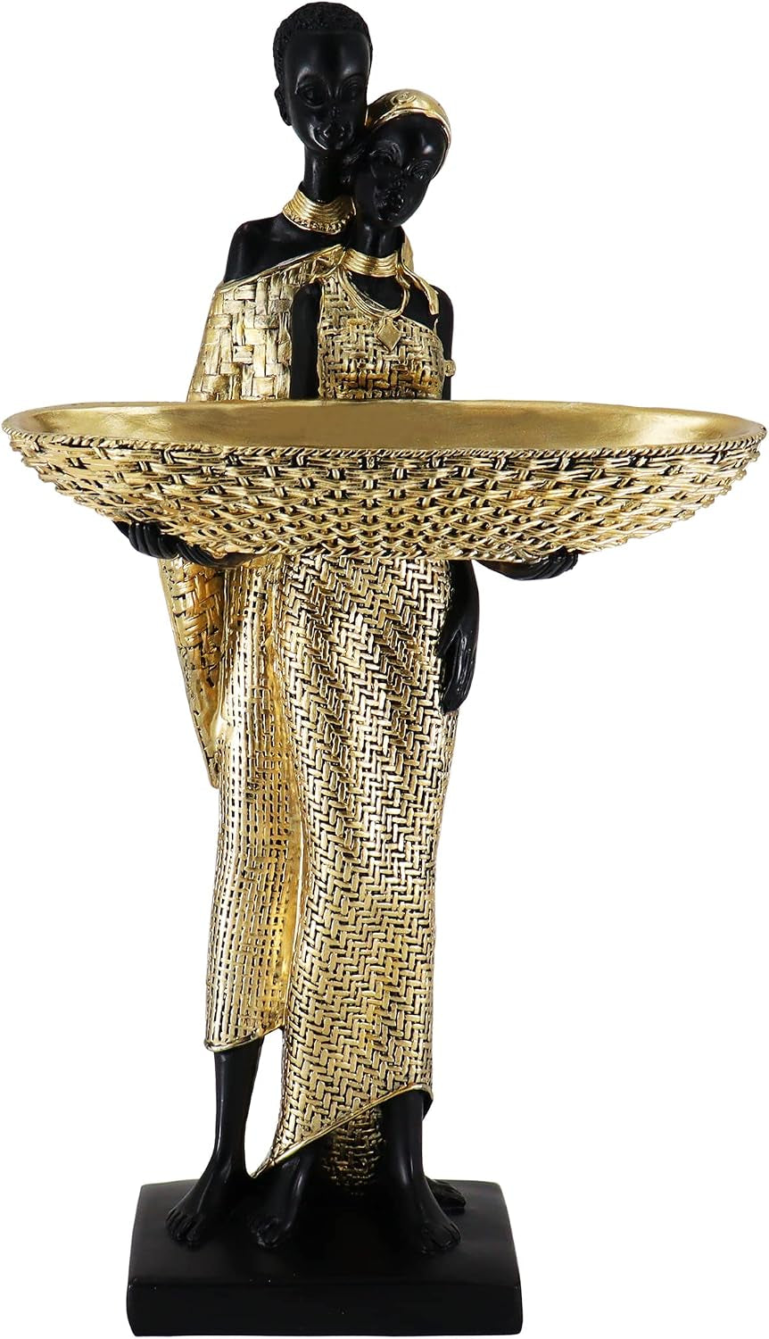 Tall black couple figurine holding a wide woven gold tray, standing on a square base