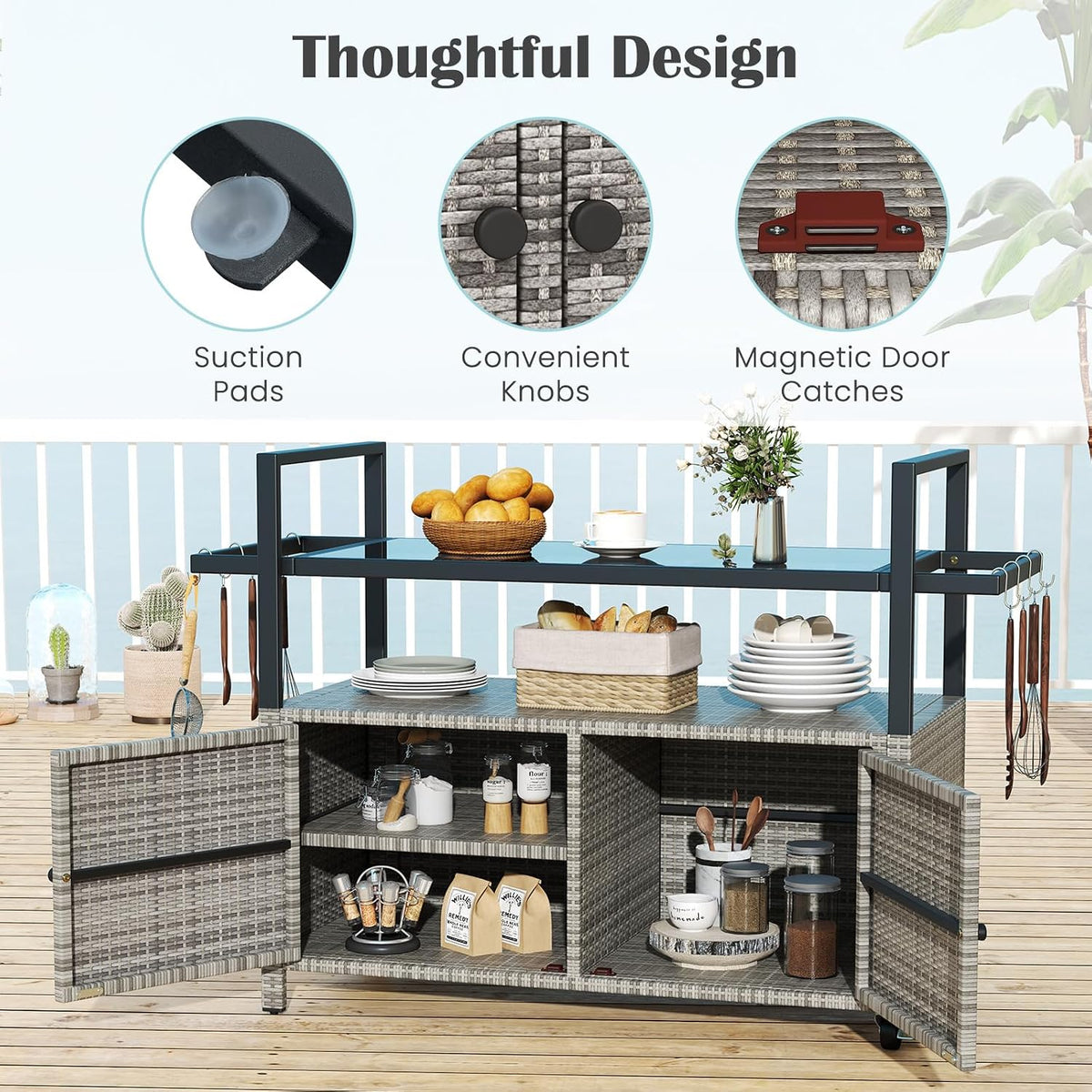 Light-gray rattan bar cart on a wooden deck with open cabinet doors and stocked shelves.
