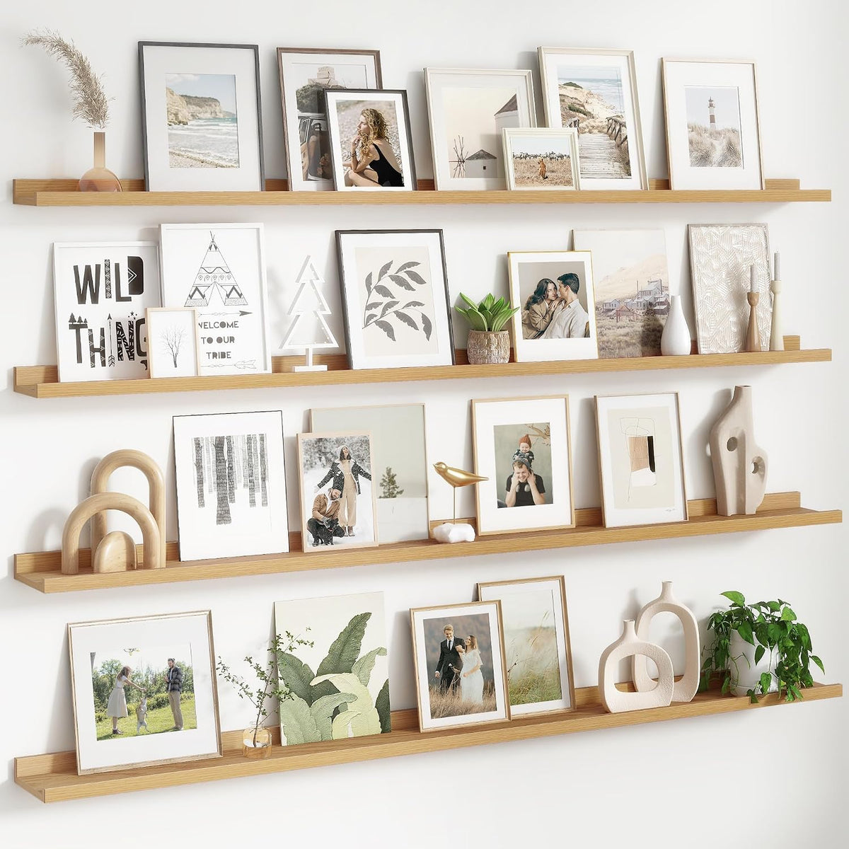 Four long light-wood floating ledges mounted vertically with framed photos and decor