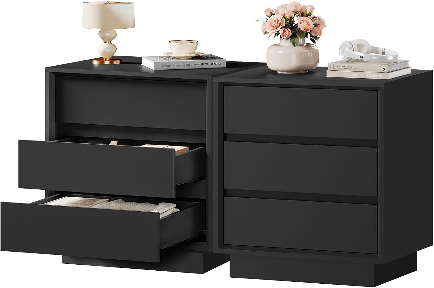 Two black nightstands side-by-side; left has two drawers open, right shows three closed drawers with decor on top.