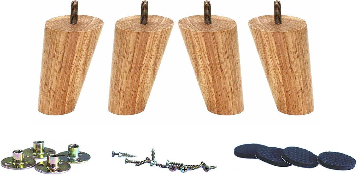 Straight-on shot of four natural wood tapered legs slightly angled, with metal plates, loose screws, and adhesive black foot