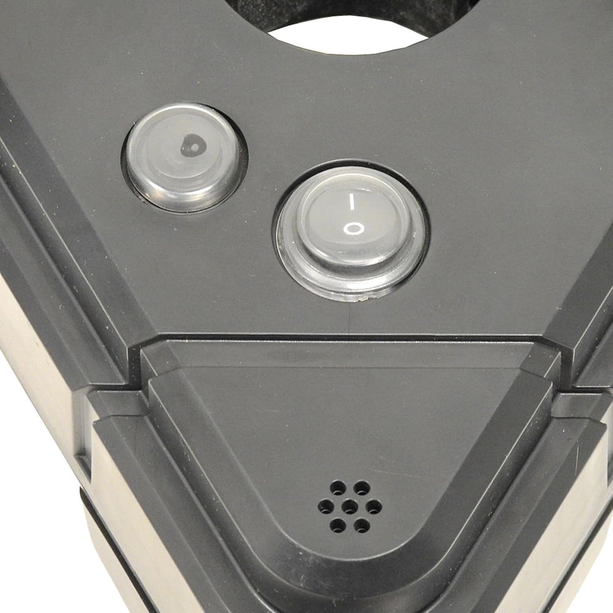 Triangular control hub close-up showing onboard power and selector buttons on black plastic housing