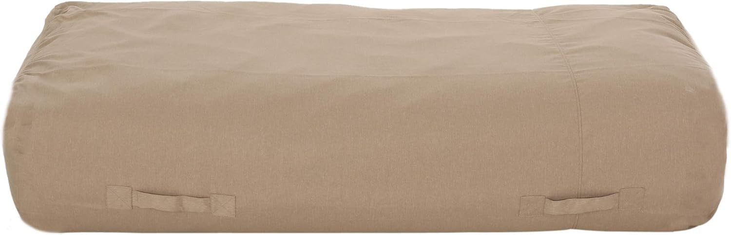 Front view of a rectangular floor lounger in light tan showing fabric drape and dual handles.