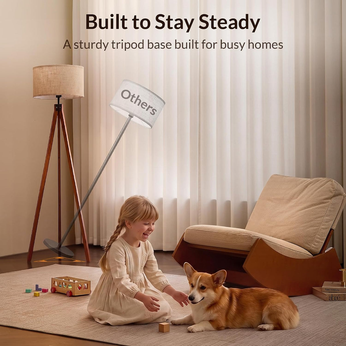 Tripod floor lamp in a family room setting demonstrating a sturdy tripod base while a child and dog play nearby