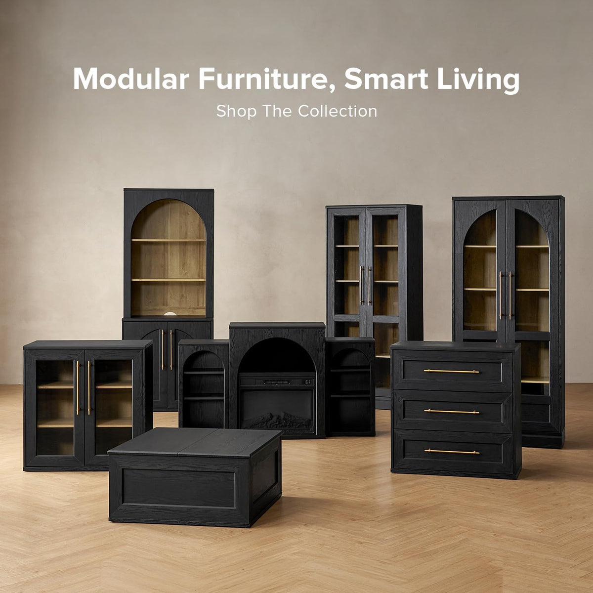 Group of modular black storage cabinets and a low black coffee table arranged on a herringbone floor.