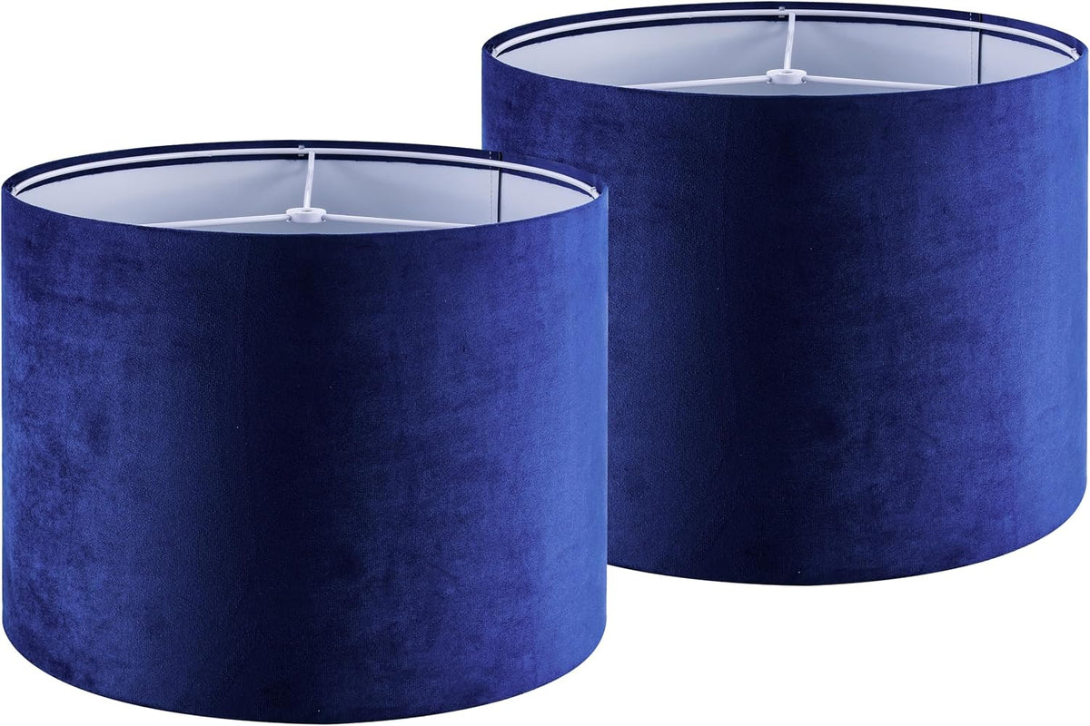 Two navy blue cylindrical drum lamp shades shown side by side on white background.