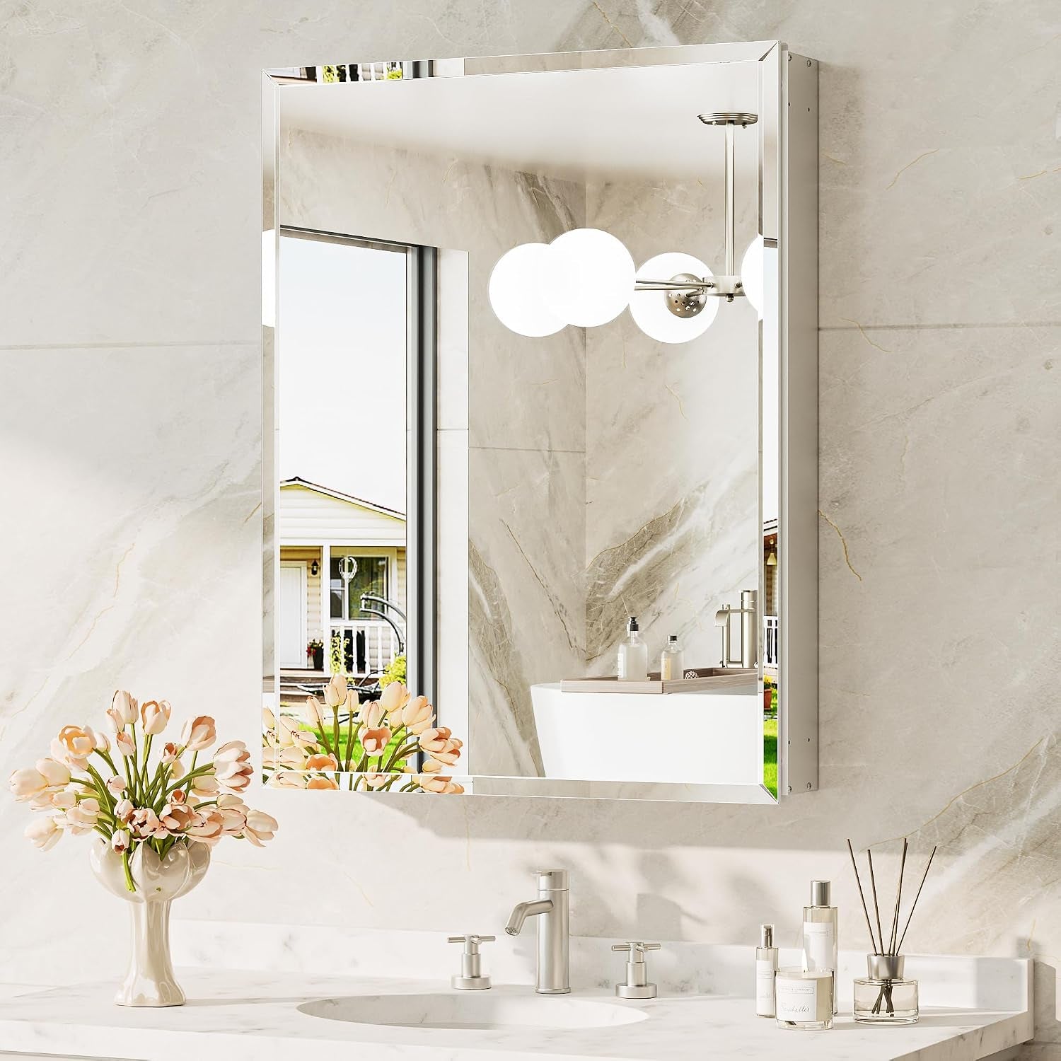 Single mirrored medicine cabinet reflecting a modern light fixture and bathroom wall.
