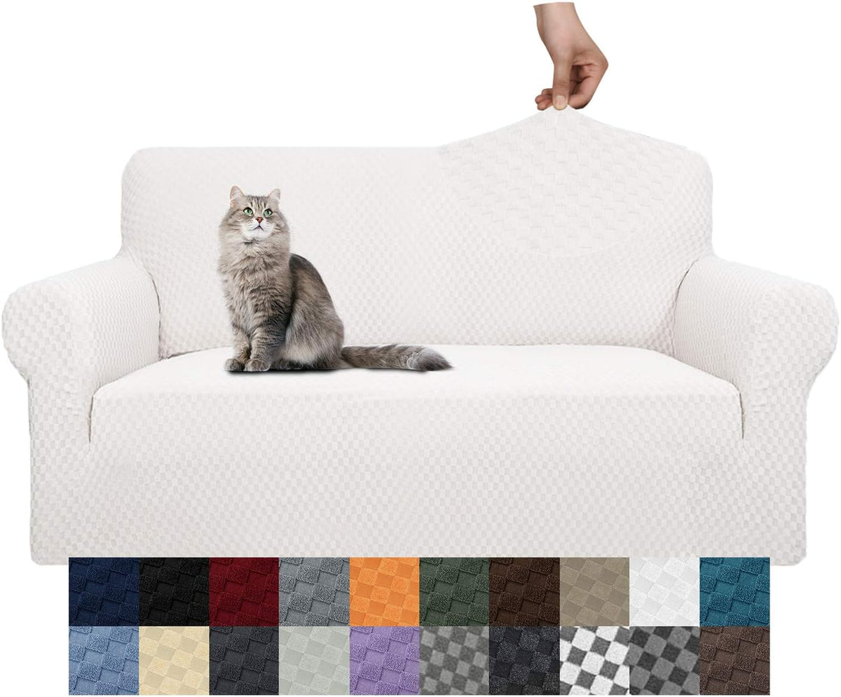 White jacquard stretch sofa cover on three-seat sofa with a grey cat and color swatches below