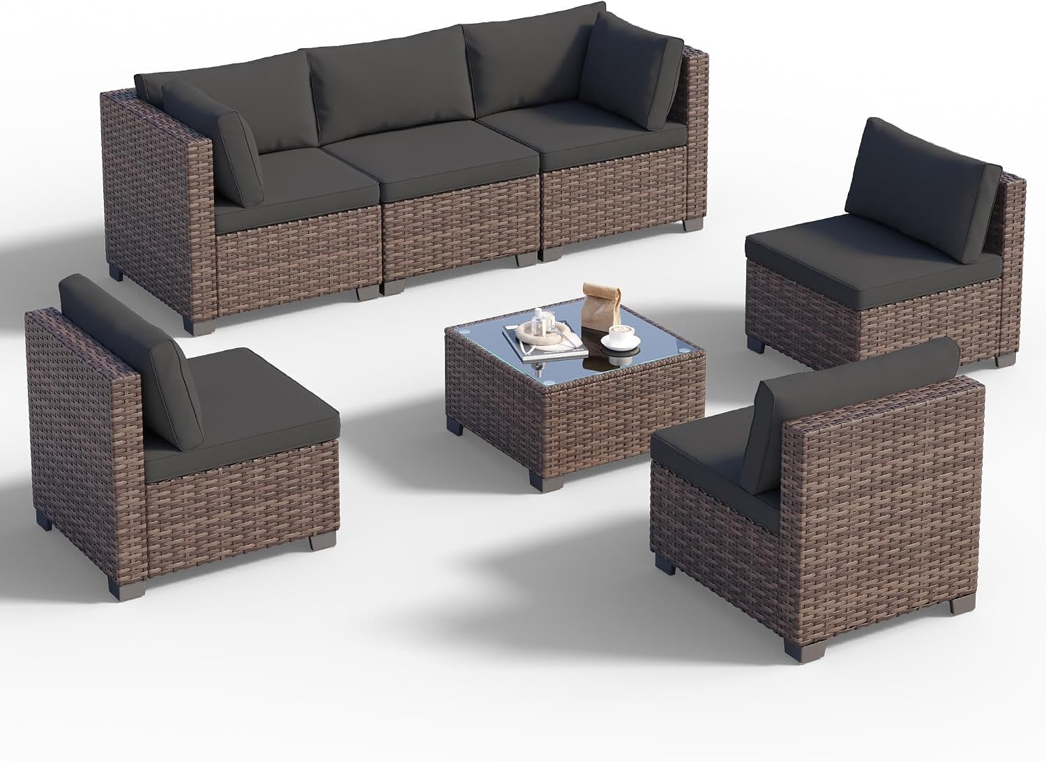 Seven-piece rattan seating set arranged around a square tempered-glass coffee table on a white background.