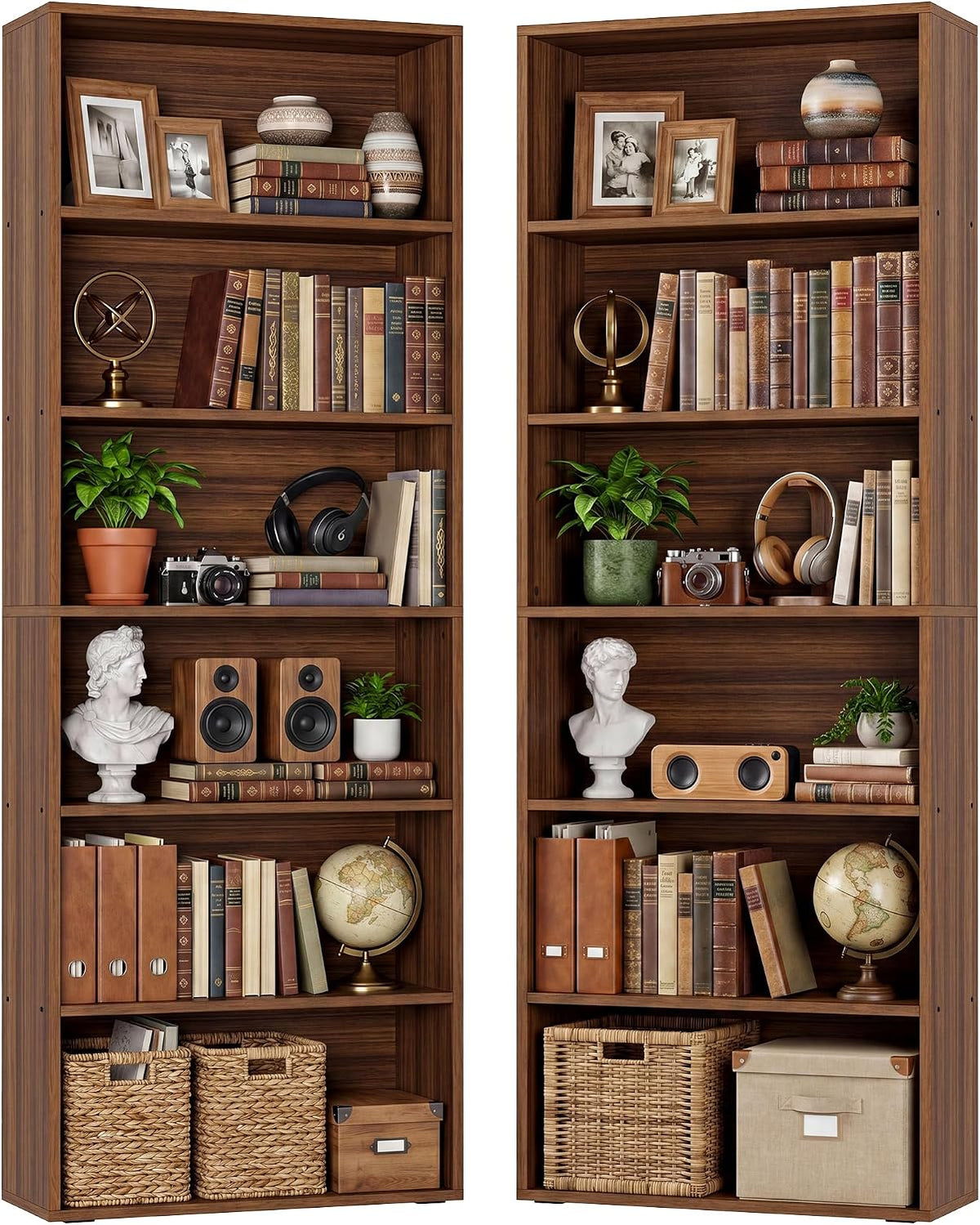 Two oak-toned bookcases side-by-side styled with globes, bust sculptures, woven baskets and stacked books